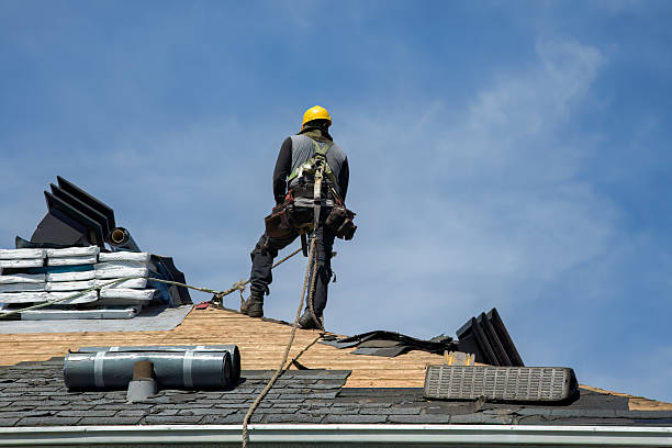 Professional Gutter Installation technician working in Farnhamville, IA